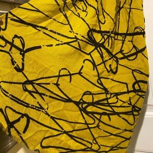 CUTEST SCARF/WRAP! It’s hangers all over it!